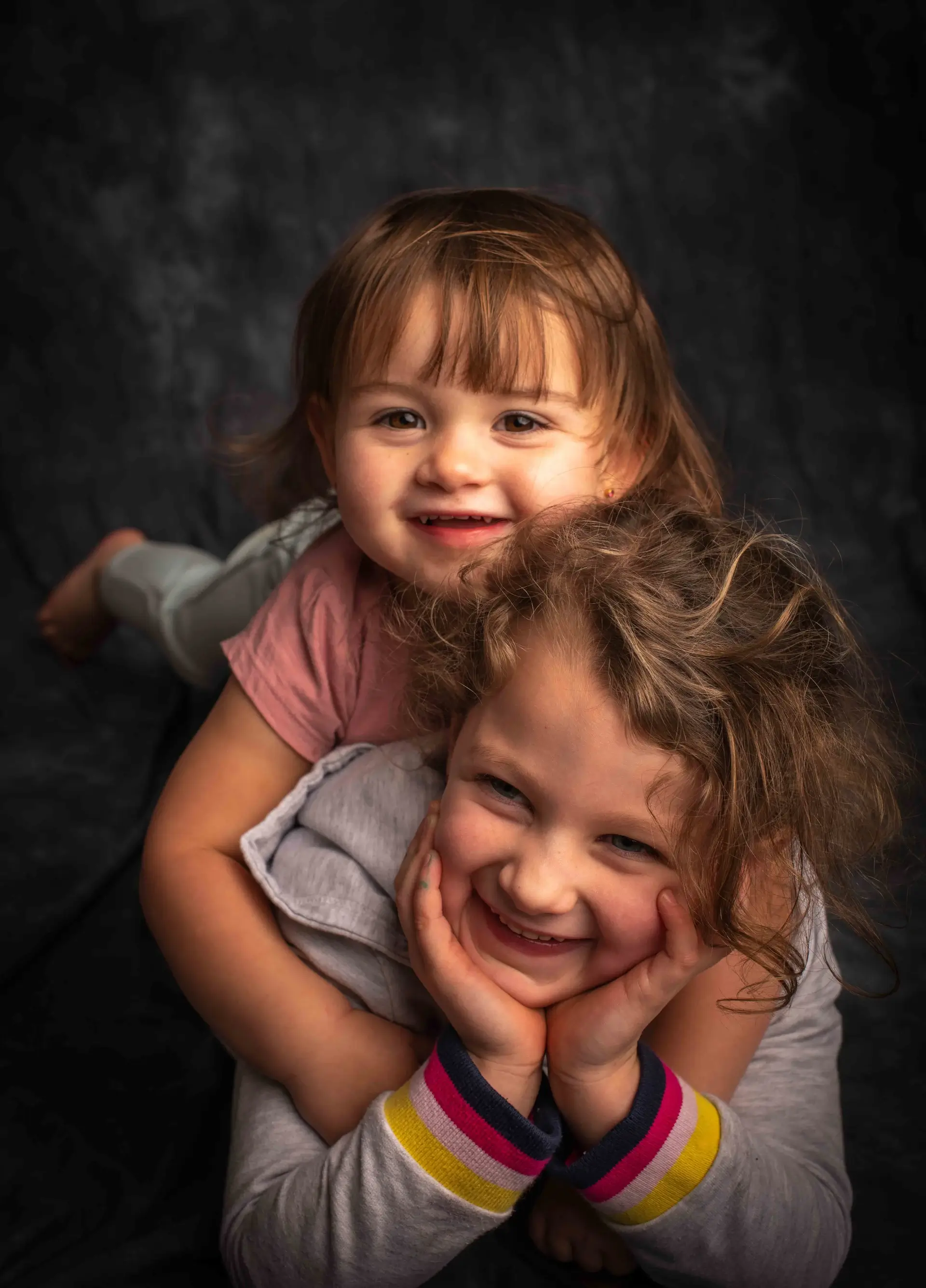 Professional family portrait session in natural setting